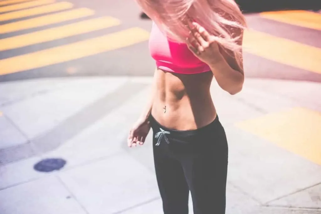 Woman with toned stomach after LA-EMS Body Sculpting Treatment Orpington